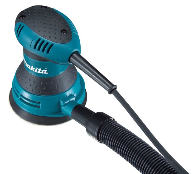 Przejdź do produktu Makita BO5030 szlifierka mimośrodowa elektryczna, 300 W, talerz 125 mm, podwójna izolacja, hamulec, mocowanie na rzep, odciąg pyłu z możliwością podłączenia urządzenia odsysającego