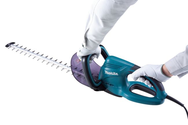 Przejdź do produktu Makita UH4570 nożyce do żywopłotu elektryczne 550 W, z ostrzem 450 mm, wydajne, lekkie, kompaktowe, idealne do użytku domowego do prac ogrodniczych